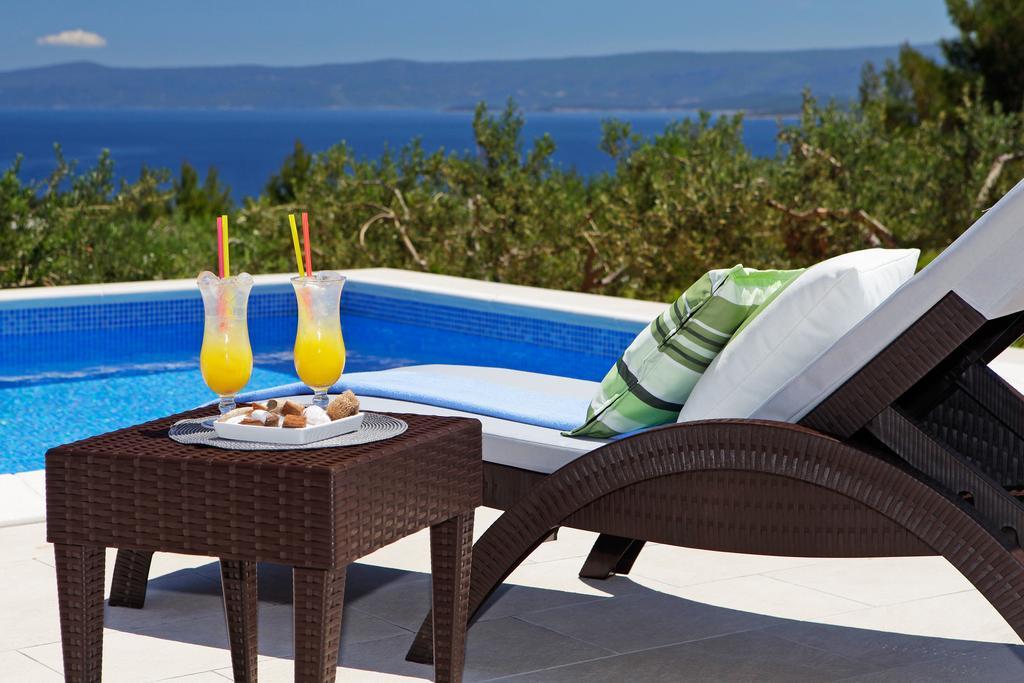 Holiday Homes Oliva Bol Szoba fotó