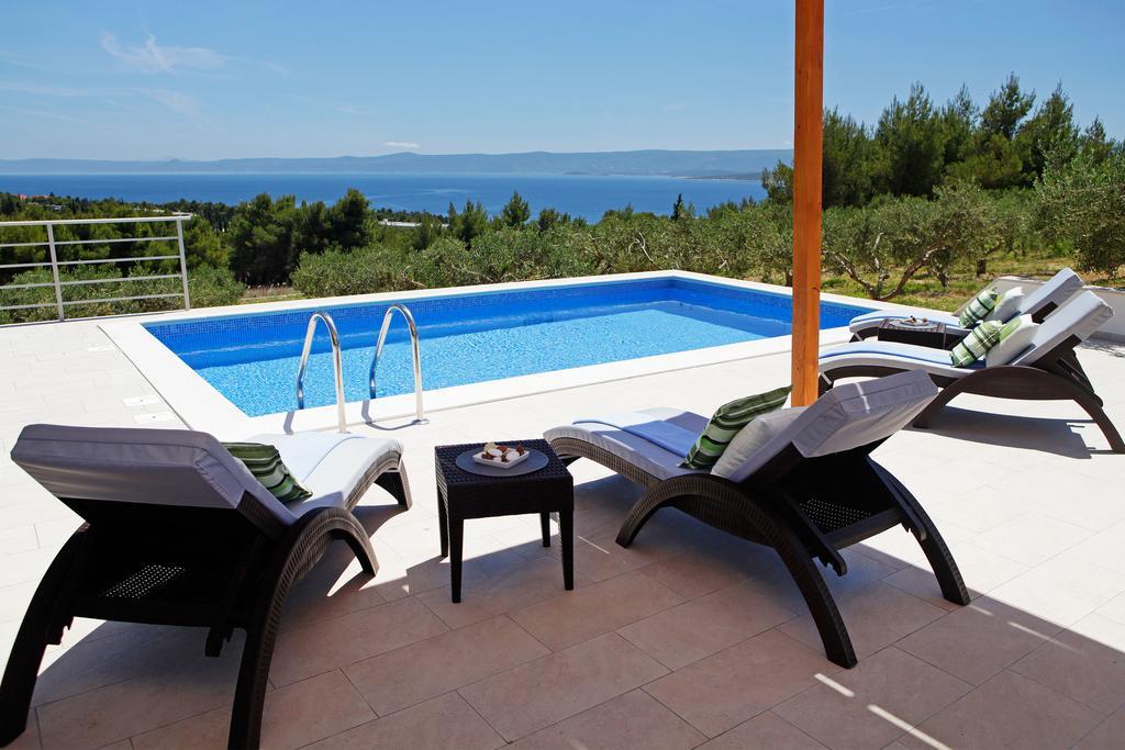 Holiday Homes Oliva Bol Szoba fotó